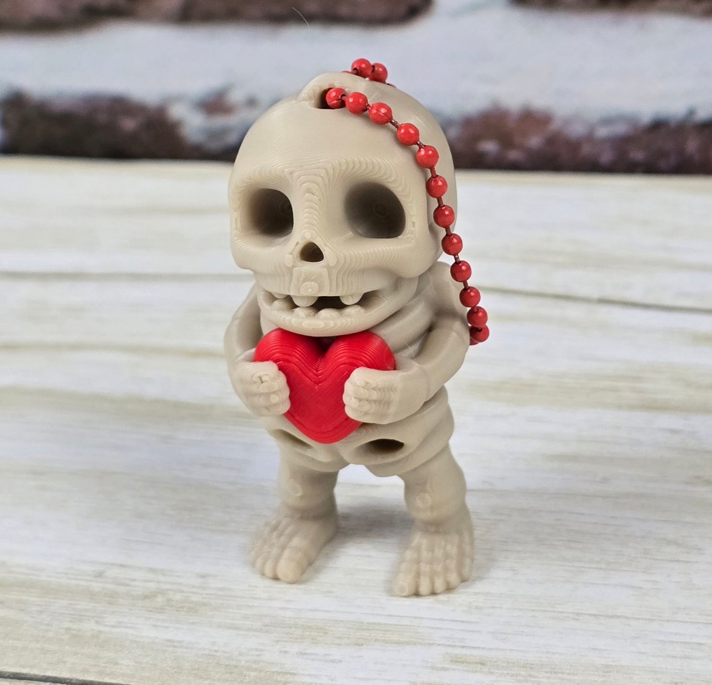 Tiny Articulated Skeleton with Heart Keychain