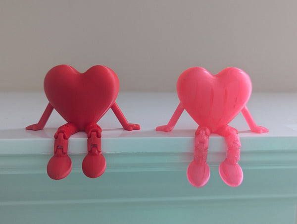 3D Printed Heart Figurines with Dangling Legs